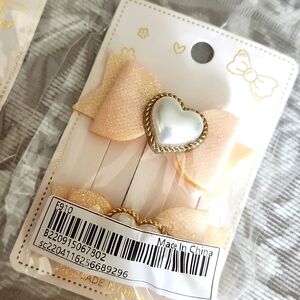 Pearl heart bow